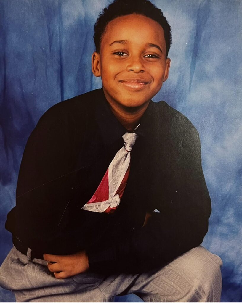 smiling child wearing a tie